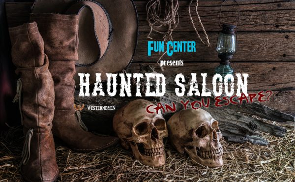 Still life with two human skulls on hay with traditional leather boots and american west rodeo brown felt cowboy hat background, vintage and dark tone for horror halloween